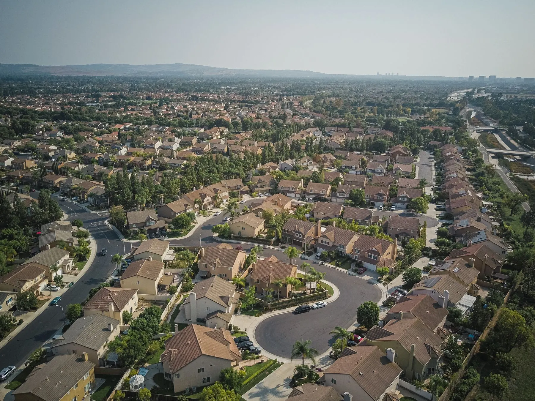 Aerial view of an Arizona neighborhood with tile roofs